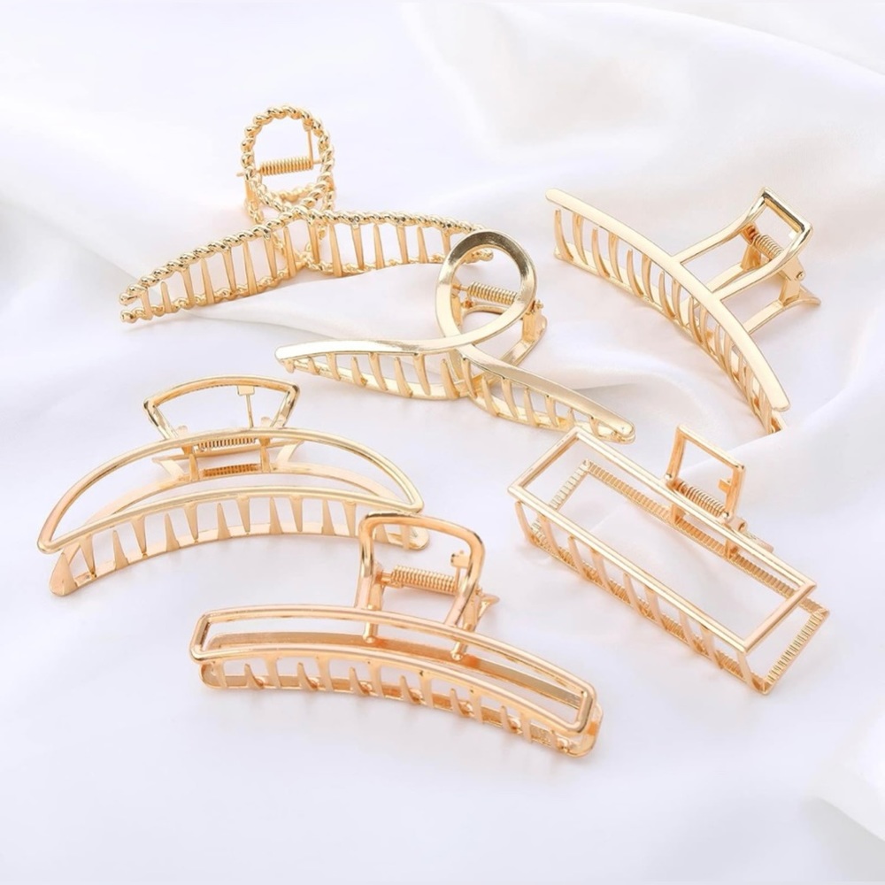 New in packaging! Lot of 3 Gold Hair Claw Clips.